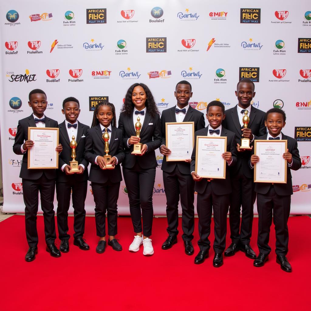 Group of African child actors at an awards ceremony