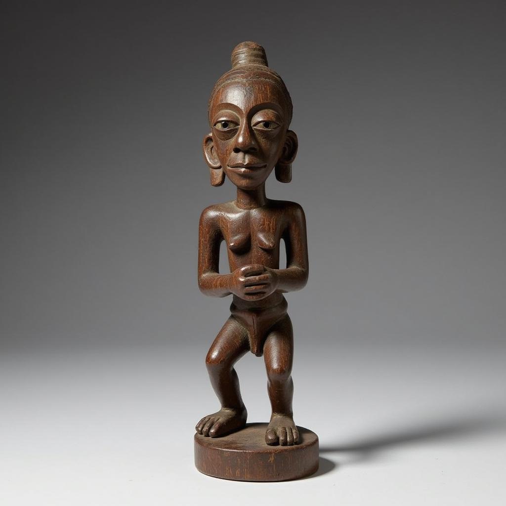 Wooden sculpture of an African deity