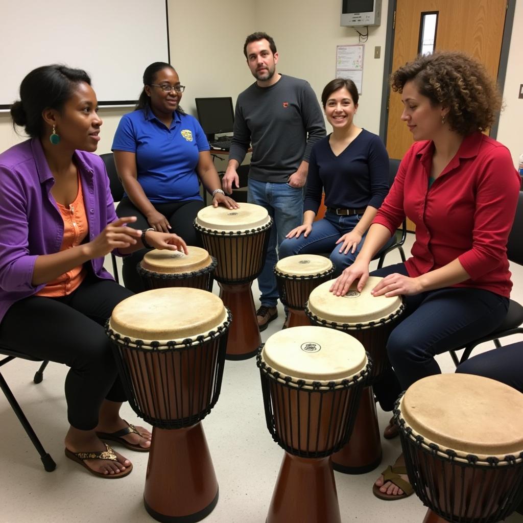 Participants learning the art of African drumming at a workshop in Delhi