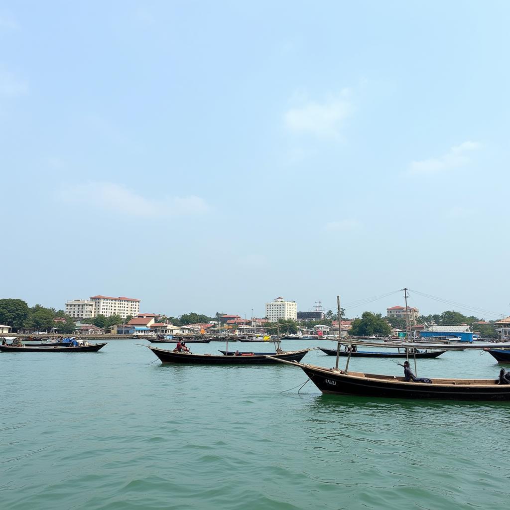 Colorful fishing boats dotting the shore in Sekondi-Takoradi, Ghana