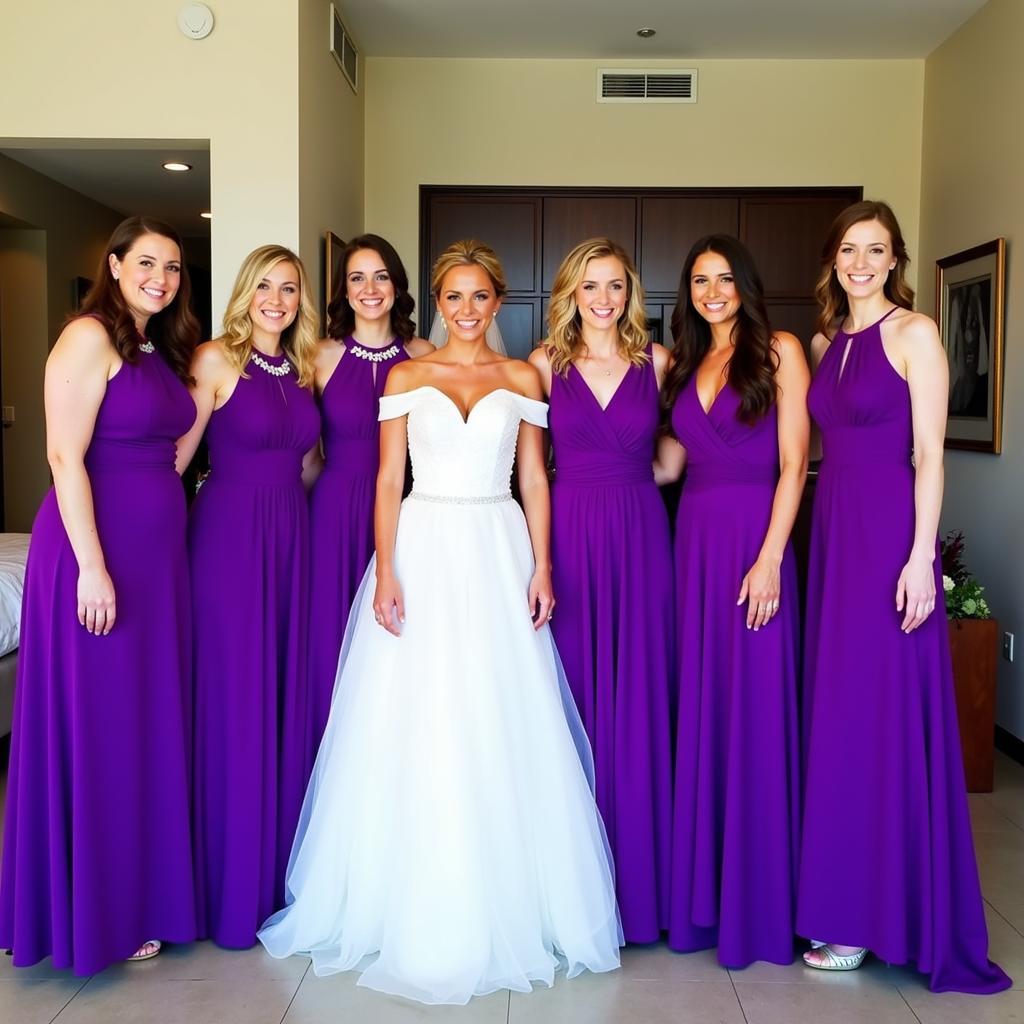 African American bridal party in vibrant purple dresses