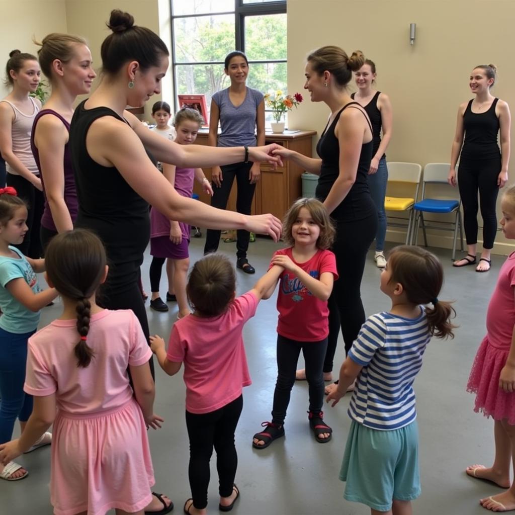 Members of an African American dance company engaging with the community through an outreach program.