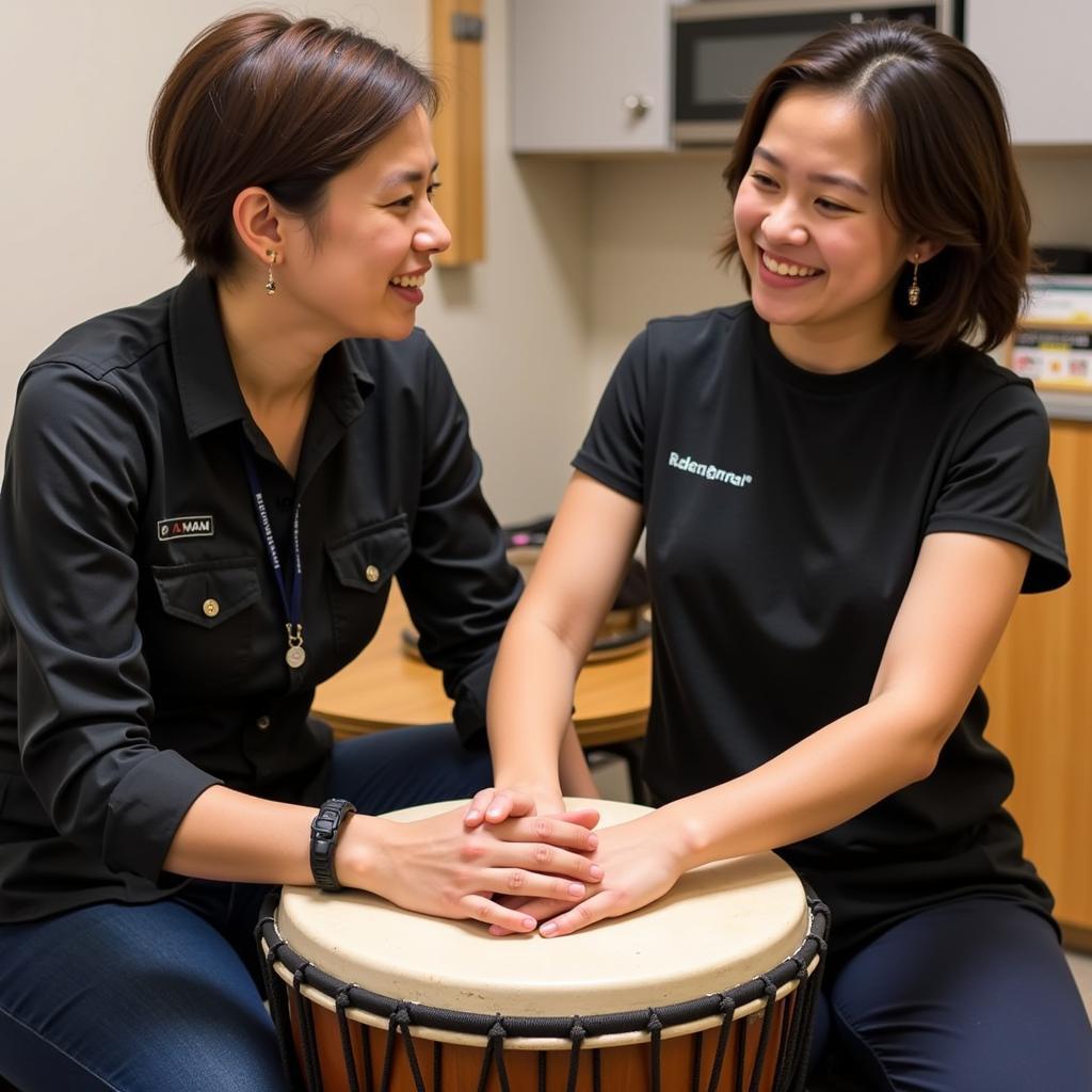 African Drumming Instructor and Student