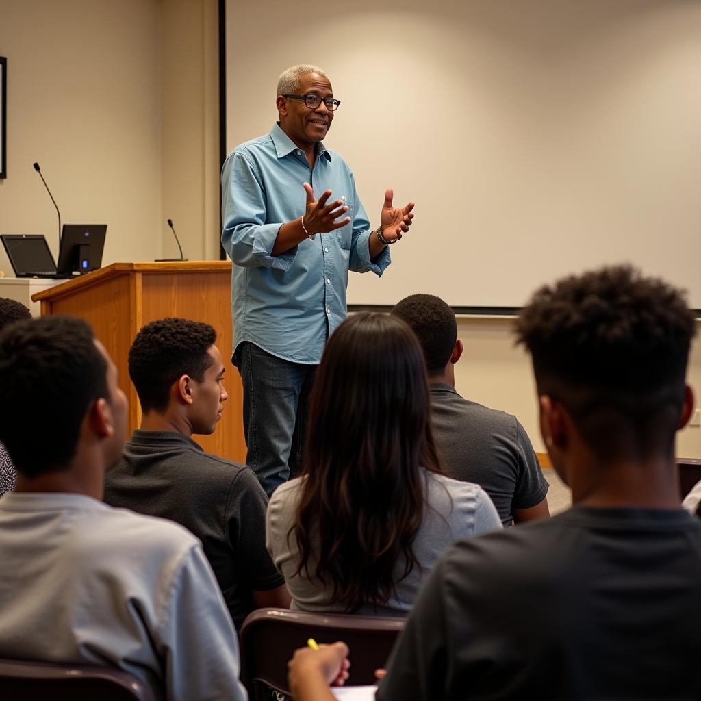 Harvey giving an inspirational talk to a group of African American teenagers.